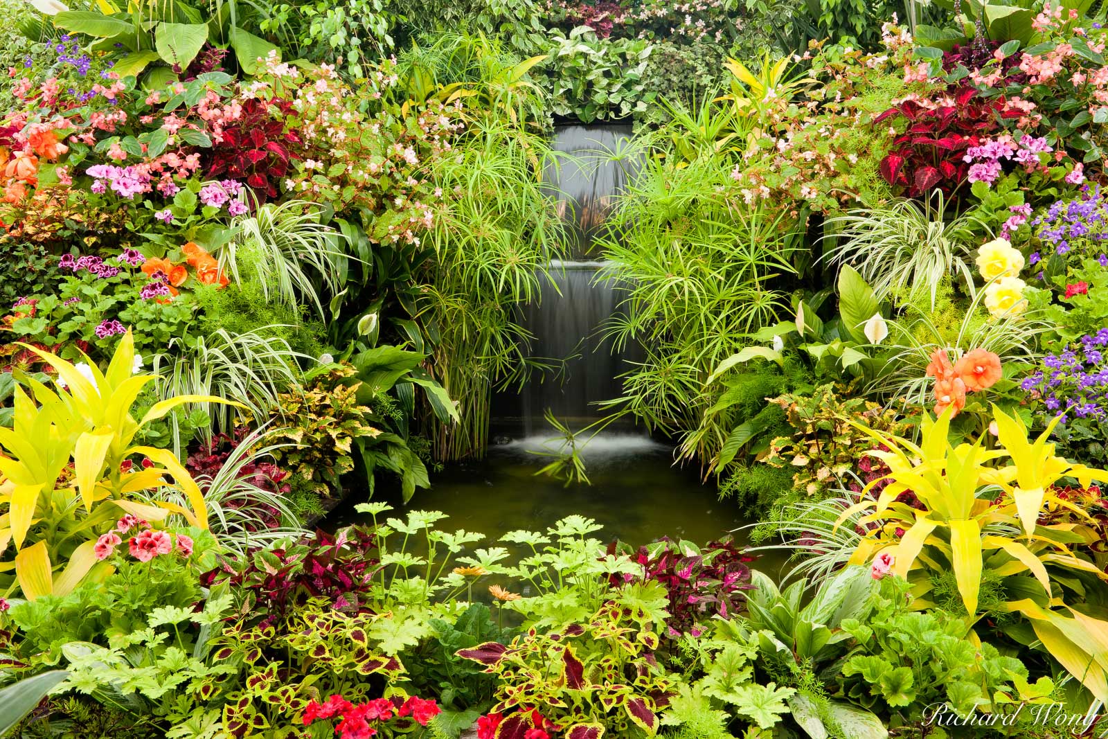 Show Greenhouse Waterfall at the Butchart Gardens, Vancouver Island, B.C.