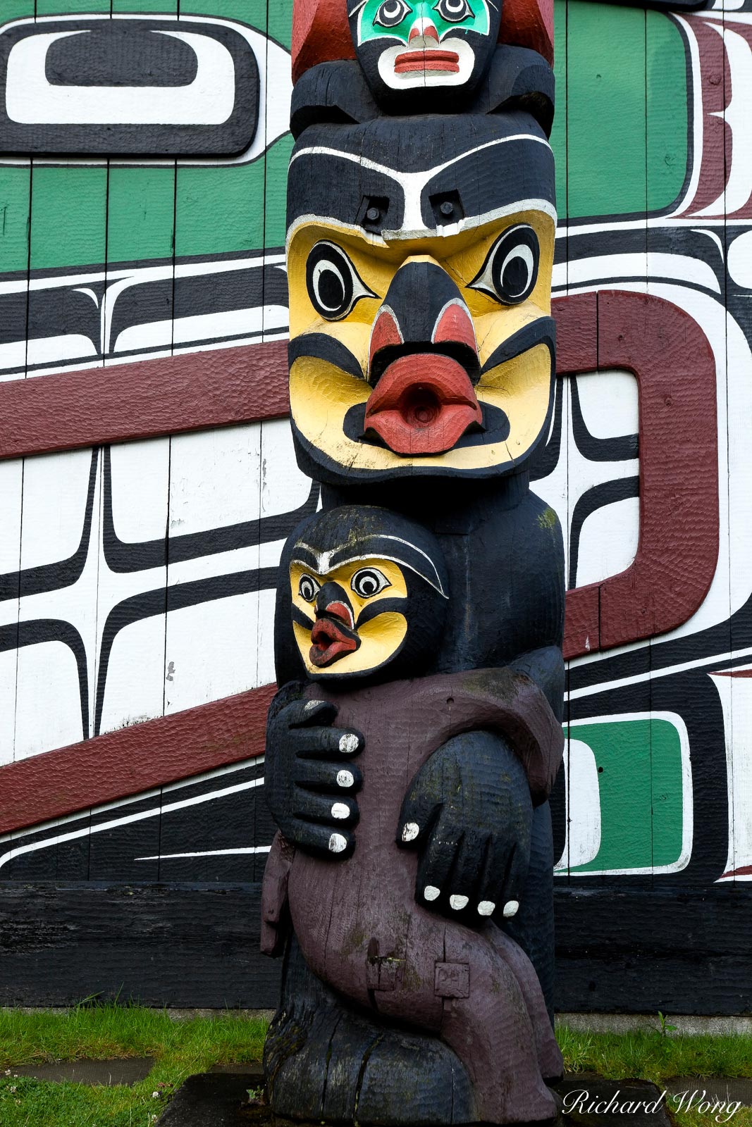 Totem Pole and Kwakwaka'wakw (Kwakiutl) Longhouse in Thunderbird Park, Victoria, B.C.