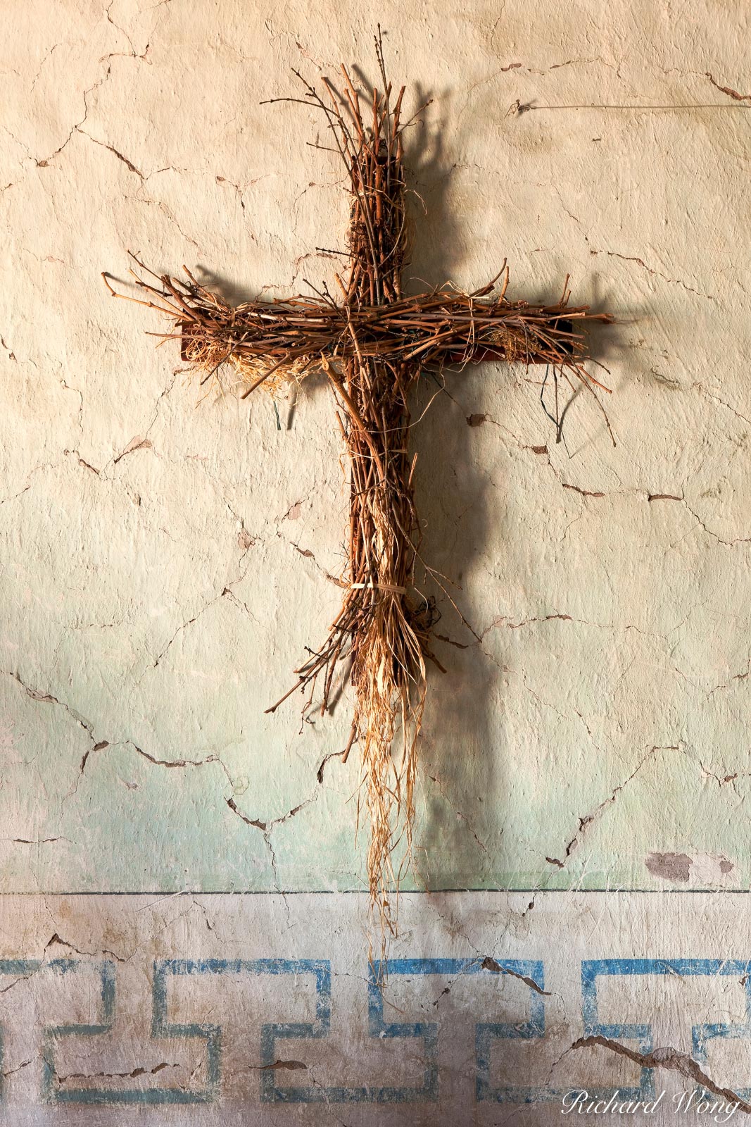 Christian Cross Made of Straw on Chapel Wall with Original Munras Murals at Mission San Miguel Arcangel, San Miguel, California