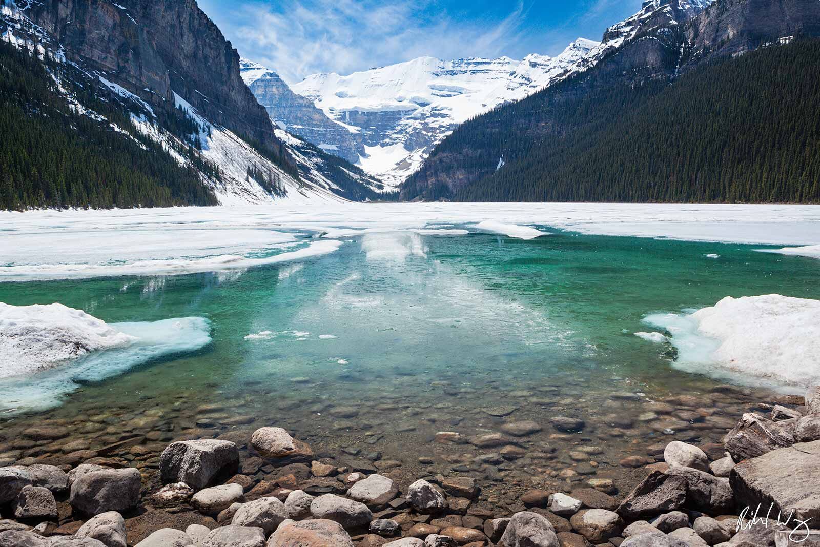 Lake Louise Partially Frozen During Spring Season With Victoria Glacier in the Background, Banff National Park, Alberta, Canada, Photo